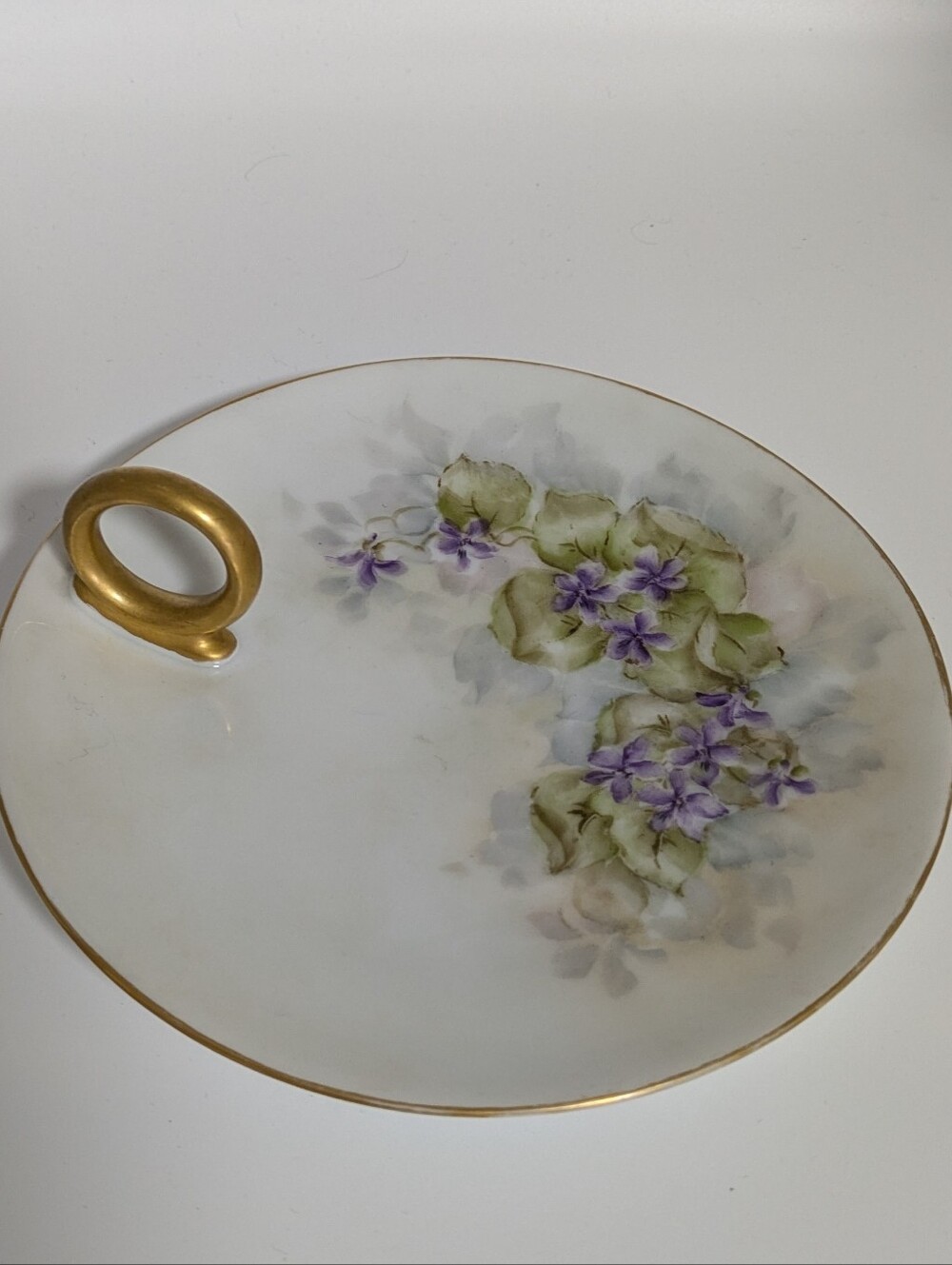 Hand-Painted White Porcelain Floral Ring-Handle Serving Plate with Gold Trim.